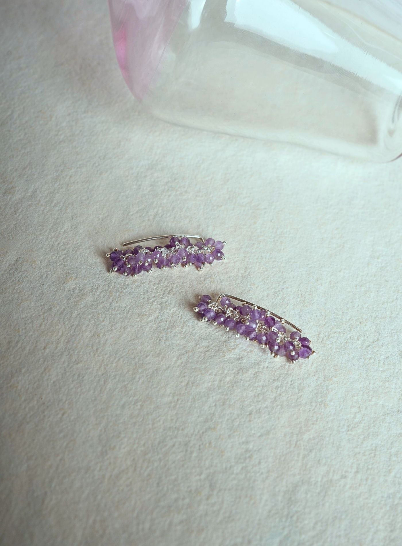 Handcrafted Sterling Silver 925 amethyst earrings featuring natural purple gemstone clusters and two-way traditional stone-setting design.