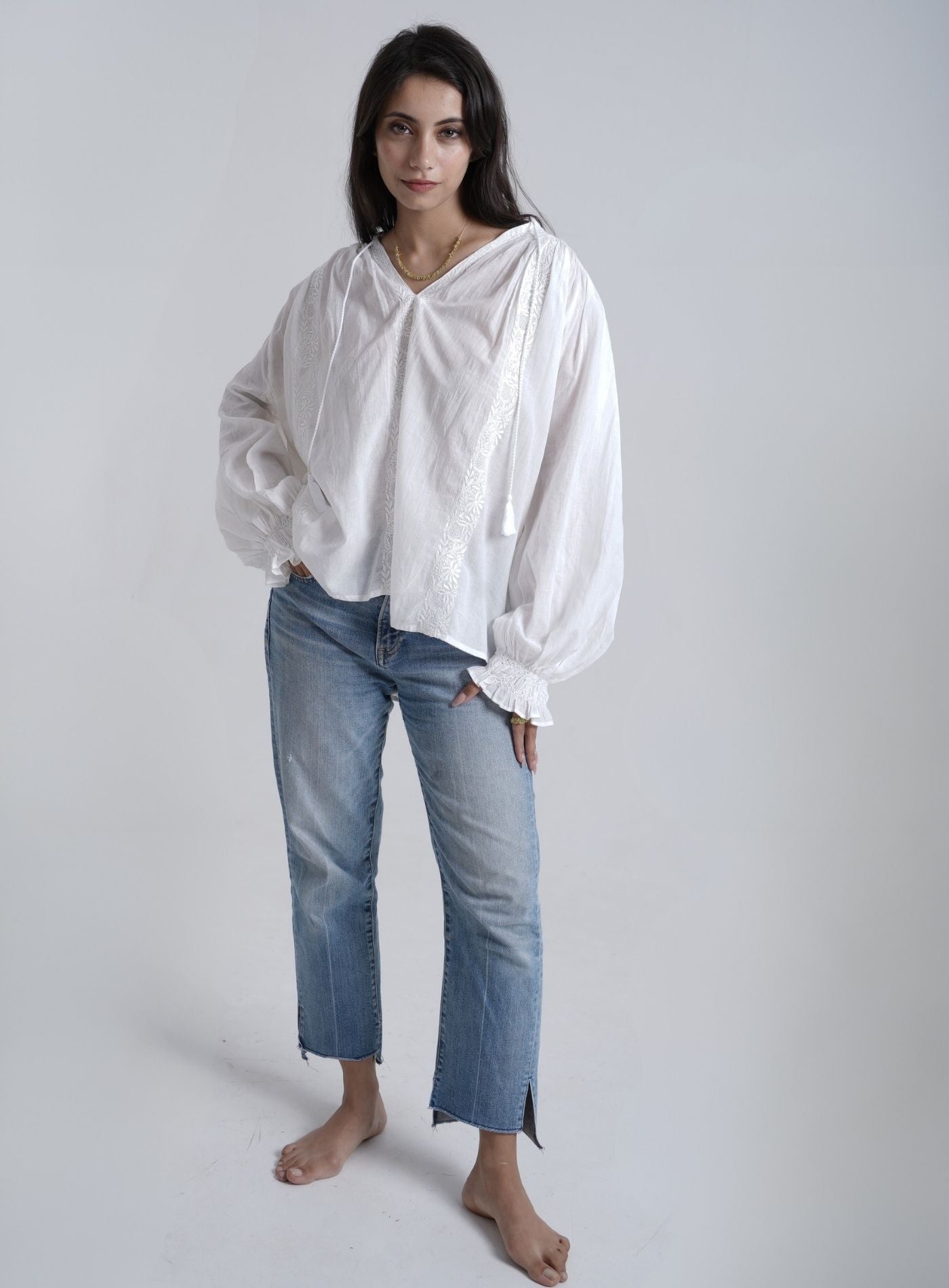 Artisav Laurence handwoven cotton embroidered white blouse with tassel tie neckline and balloon sleeves
