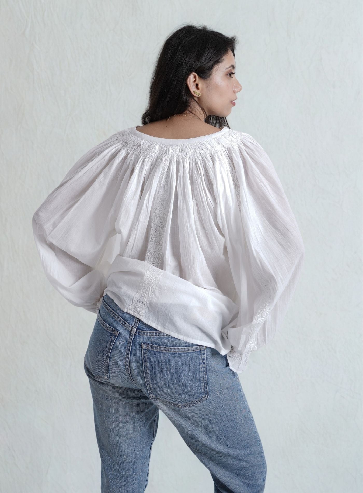 Artisav Laurence handwoven cotton embroidered white blouse with tassel tie neckline and balloon sleeves