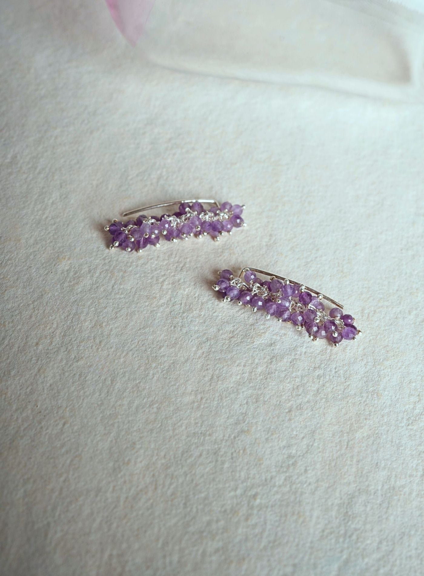 Handcrafted Sterling Silver 925 amethyst earrings featuring natural purple gemstone clusters and two-way traditional stone-setting design.