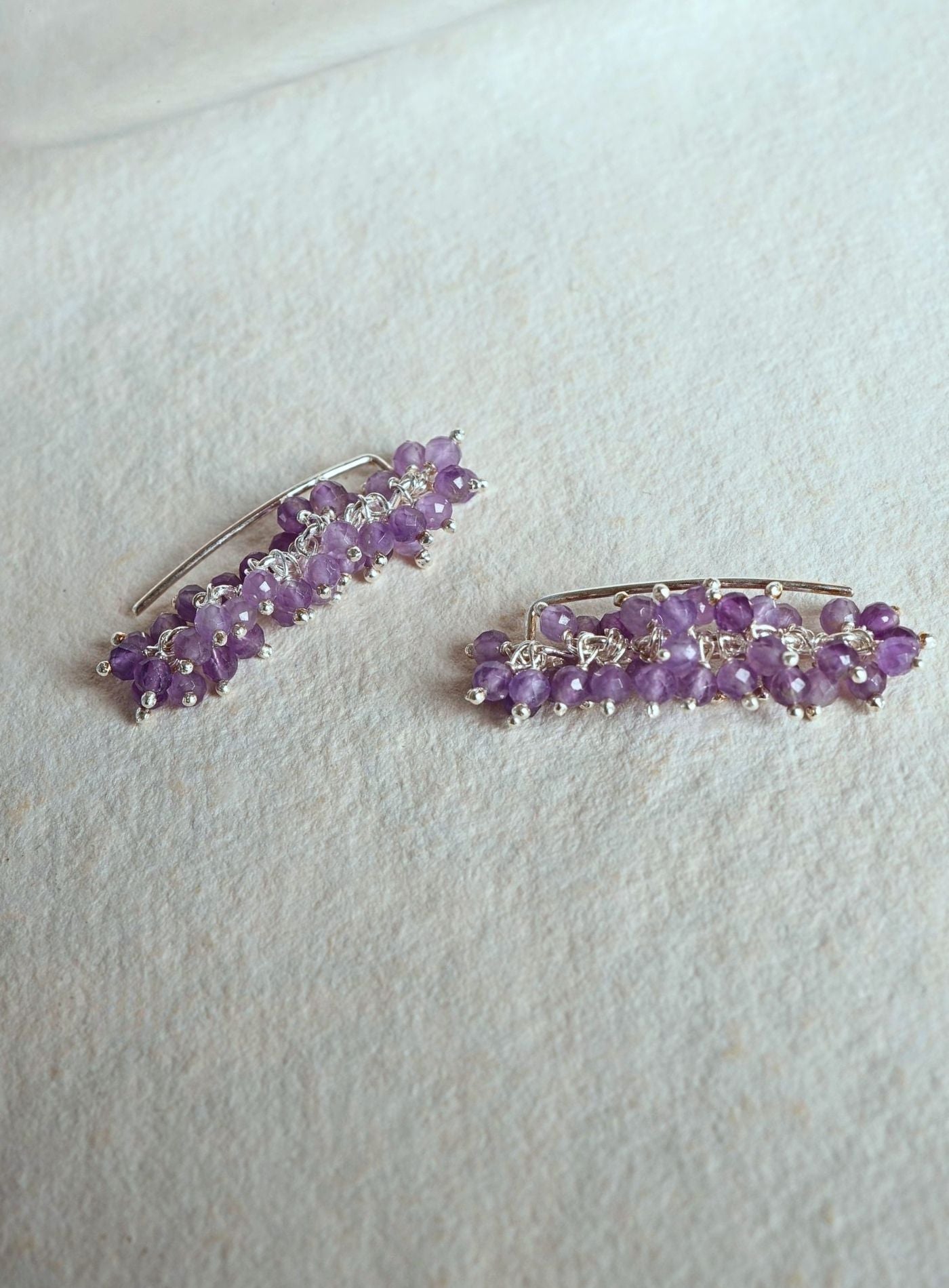 Handcrafted Sterling Silver 925 amethyst earrings featuring natural purple gemstone clusters and two-way traditional stone-setting design.